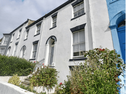 A 4-bedroom terrace freehold house in Whitby now in need of modernisation.